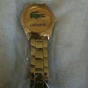 Lacoste gold tone watch